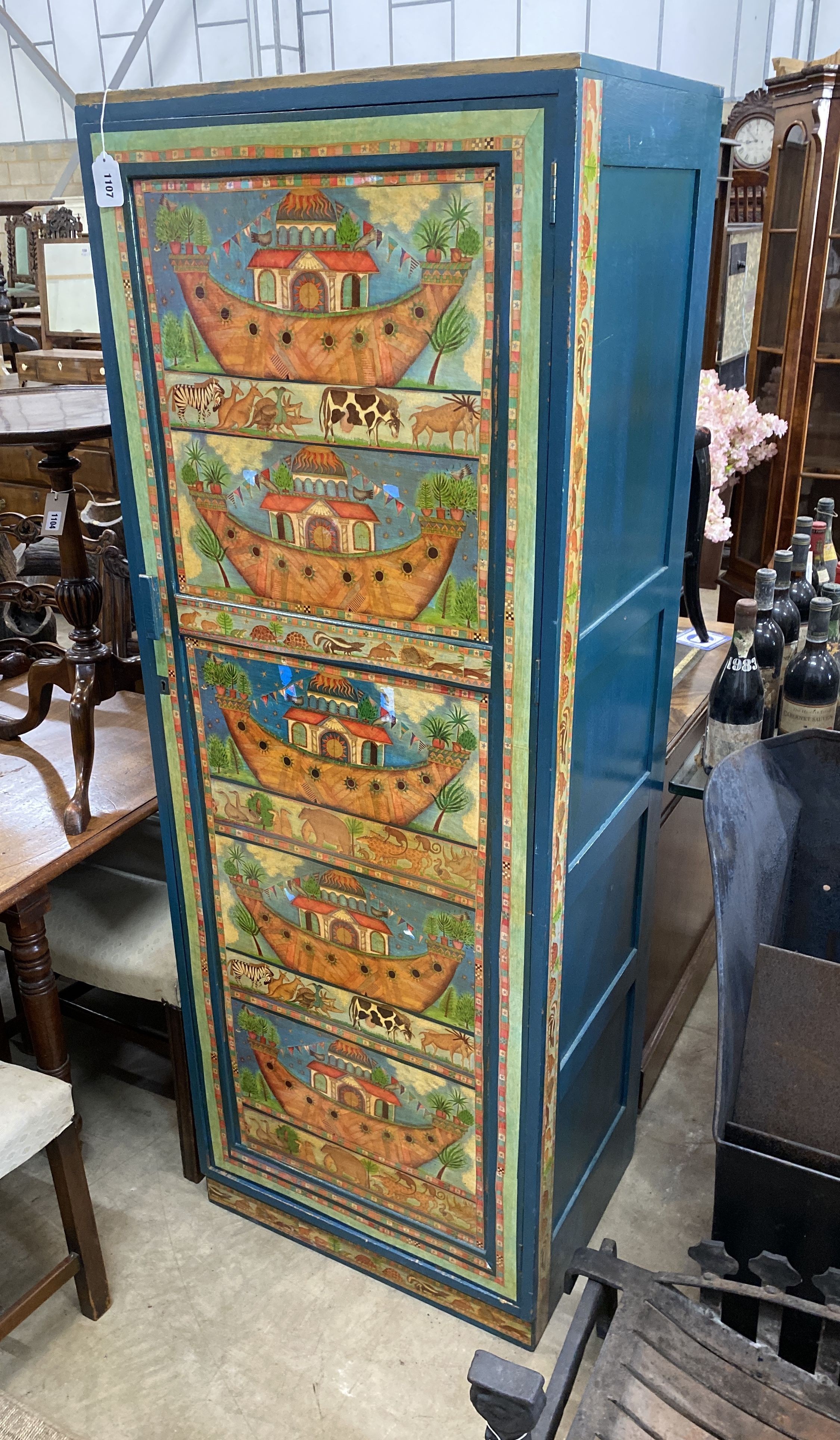 A painted child's wardrobe decorated with Noah's Ark and animals, width 61cm, depth 46cm, height 169cm